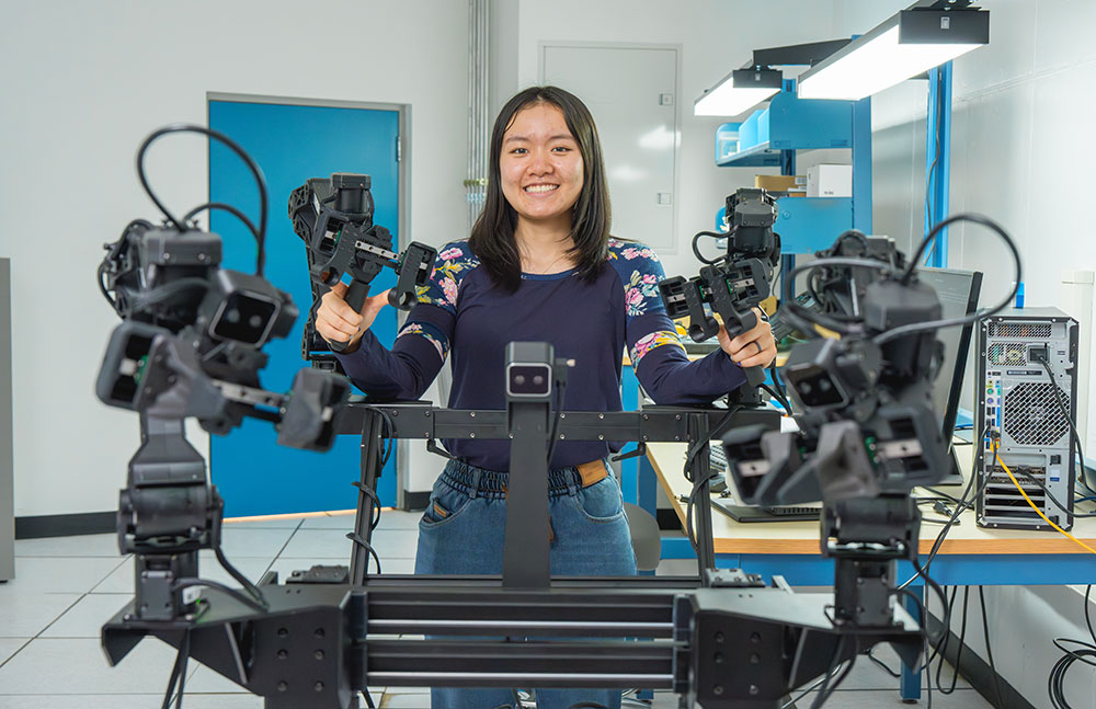 Jasmin Lin operates a robot in Brookhaven Lab's Scientific Embodied Agents Lab.