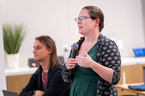 Rosi Reed speaks during symposium