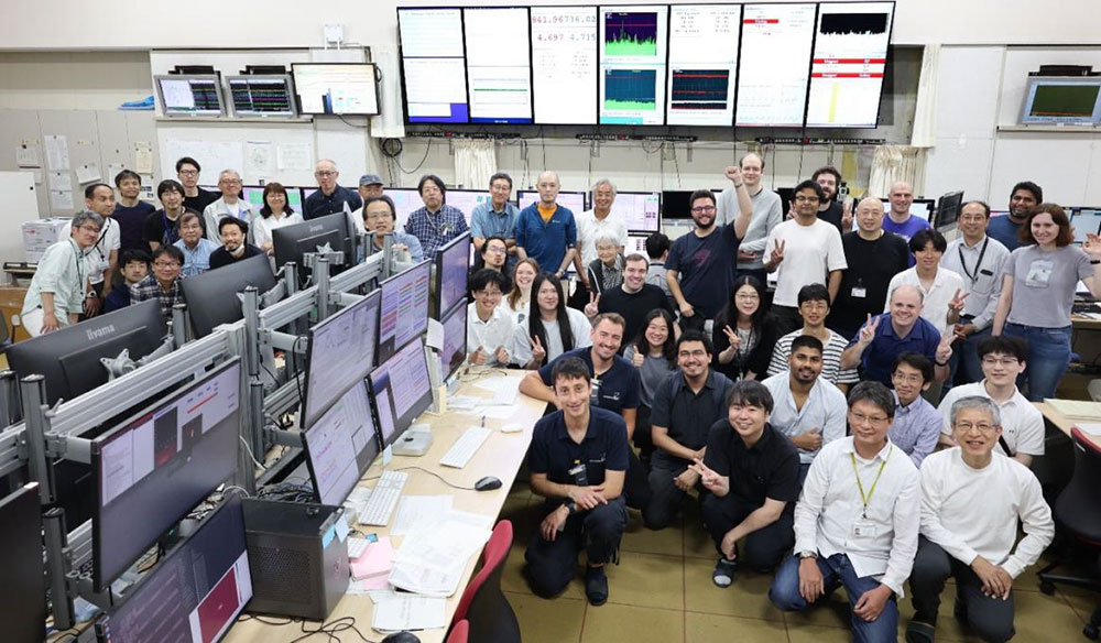 Group of researchers in a control room