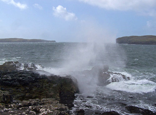 Sea spray over rocks