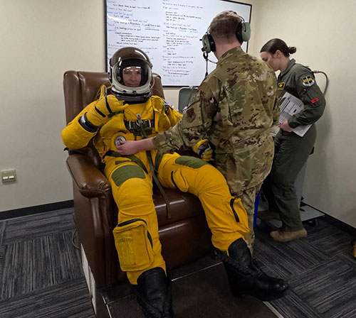 Jordan Ziegler wears a high-altitude pressure suit while preparing for a U-2 Dragon Lady flight.