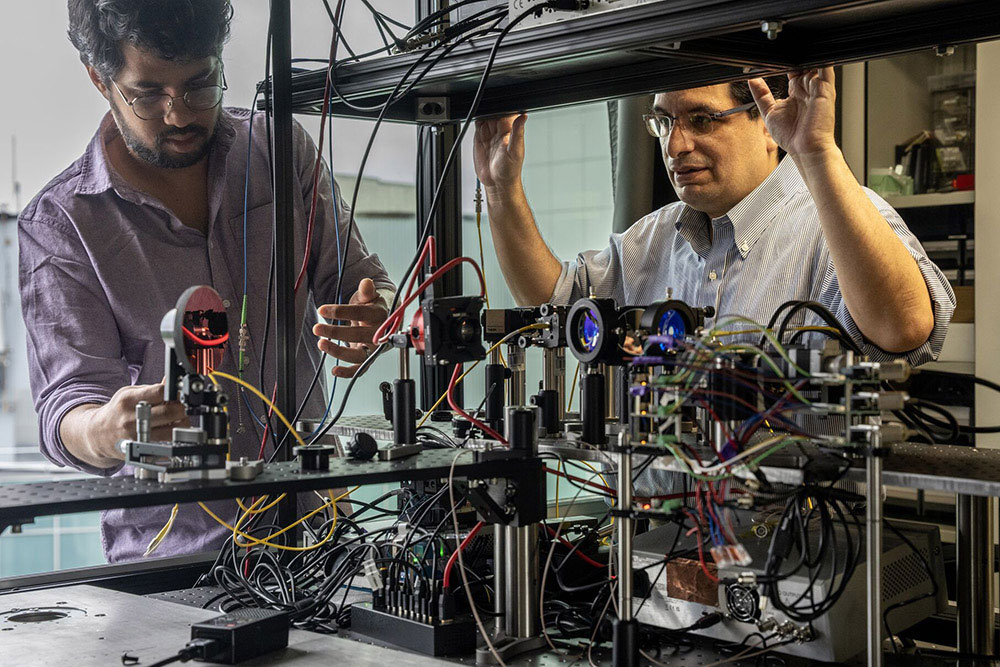 Ph.D. student Rishikesh Gokhale (left) and Eden Figueroa (right) in the Quantum Watchtower