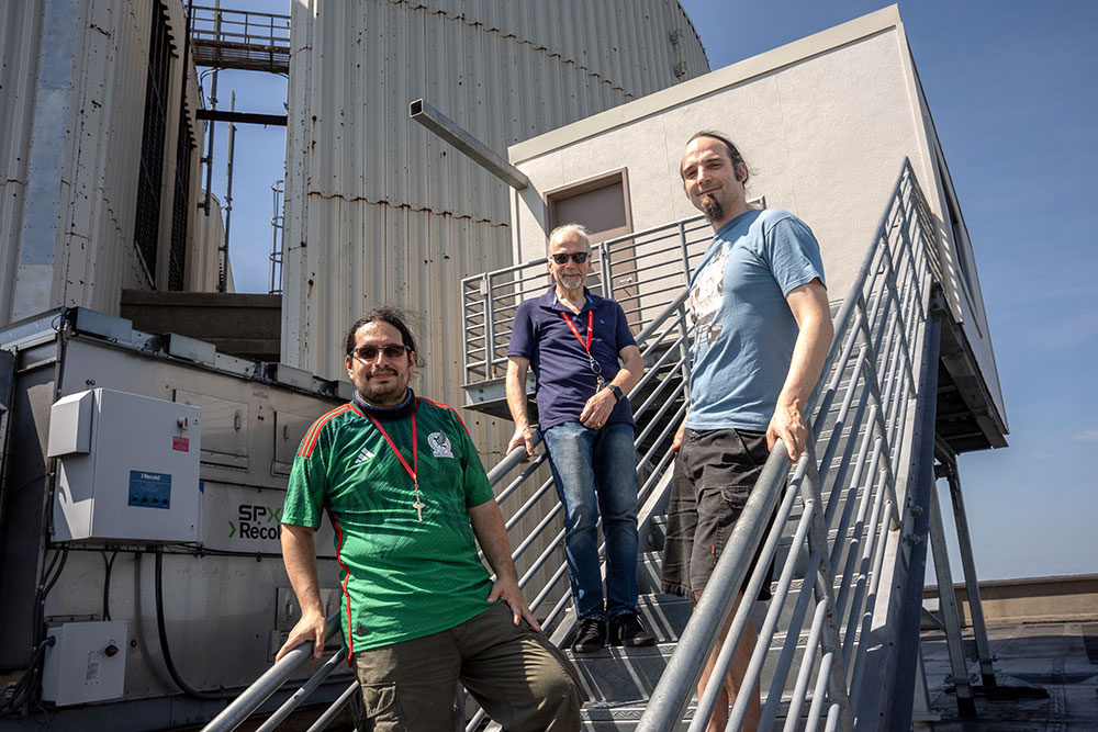 Eden Figueroa Barragan, Dimitrios Katramatos, and Ph.D. student Rishikesh Gokhale at the Quantum Wat