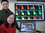 Jun Wang (sitting), Christopher Eng (standing), Jiajun Wang (left, laptop screen), and Liguang Wang