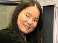 Photo of Sooyeon Hwang with the FEI Talos F200X high-resolution scanning and transmission electron m