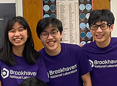 Photo of Natasha Kulviwat, Derek Minn and Brendan Shek, wearing purple t-shirts with the Brookhaven