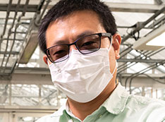 Photo of Zhiyang Zhai wearing a white face mask