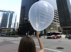 Photo of Katia Lamer launching balloon
