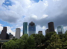 Houston skyline covered by large clouds
