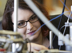 Maria Zawadowicz works on an instrument.