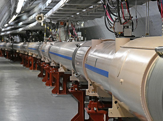 View of the interior of the Relativistic Heavy Ion Collider tunnel with a central cylindrical tube,