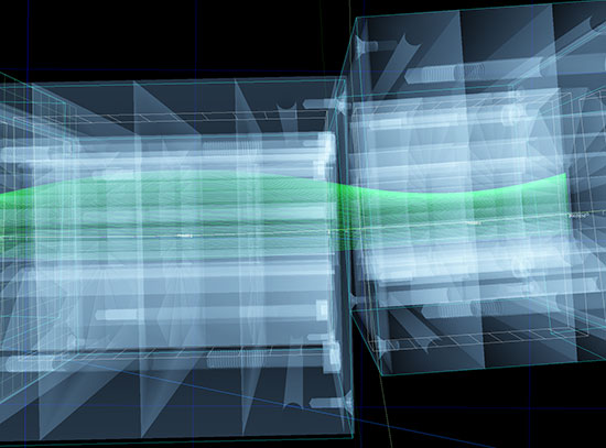A simulation of the orbits of particle beams (green) moving through a transparent model of two magne