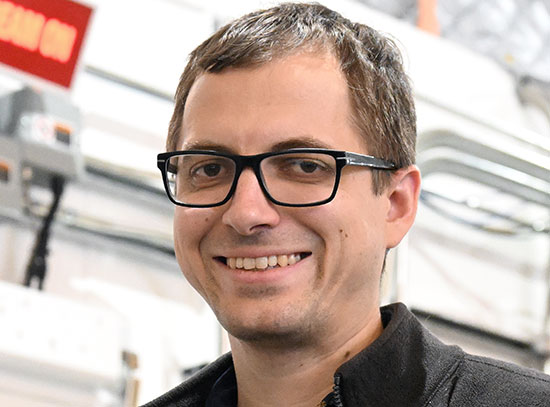 Dale Kreitler stands in the AMX beamline area at NSLS-II