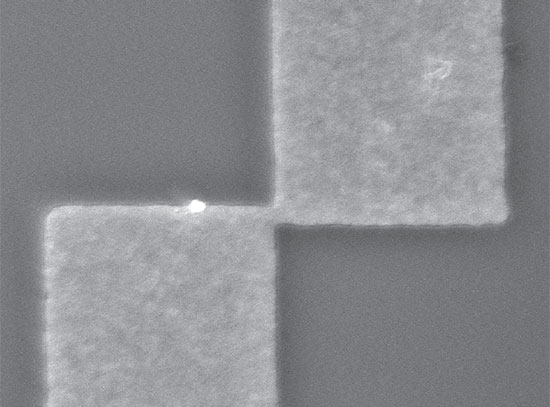 Scanning electron microscope image of a SQUID device showing platinum silicide layers connected by a