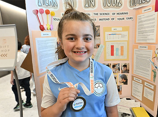 Fourth grade winner Gabrielle Opisso
