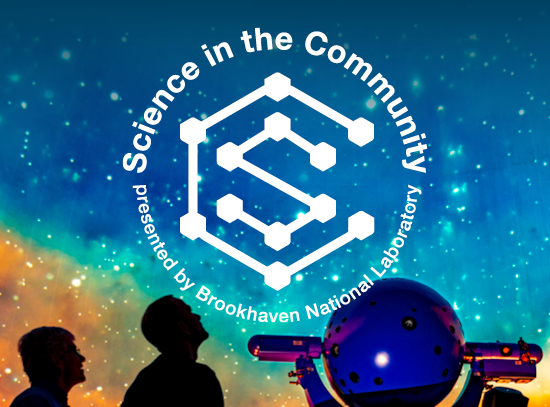Two silhouetted figures look up at a colorful planetarium display