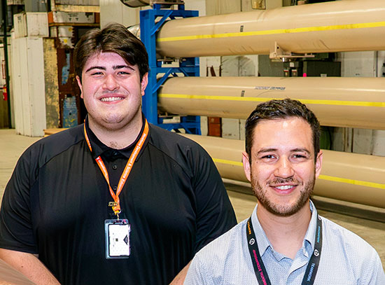 Summer intern Robert Desjardins, left, and his mentor, mechanical engineer Jonathon Greene