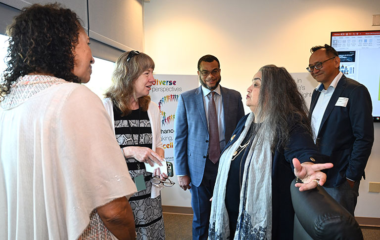 Anita Farrington, JoAnne Hewett, Noel Blackburn, Gladys Palma de Schrynemakers, and Lee Bitsó