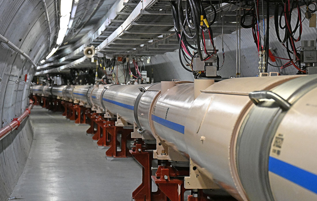 View of the interior of the Relativistic Heavy Ion Collider tunnel with a central cylindrical tube,