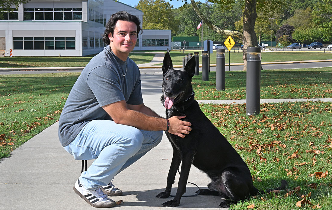 Nick Malucci and Remco, a Belgian Malinois