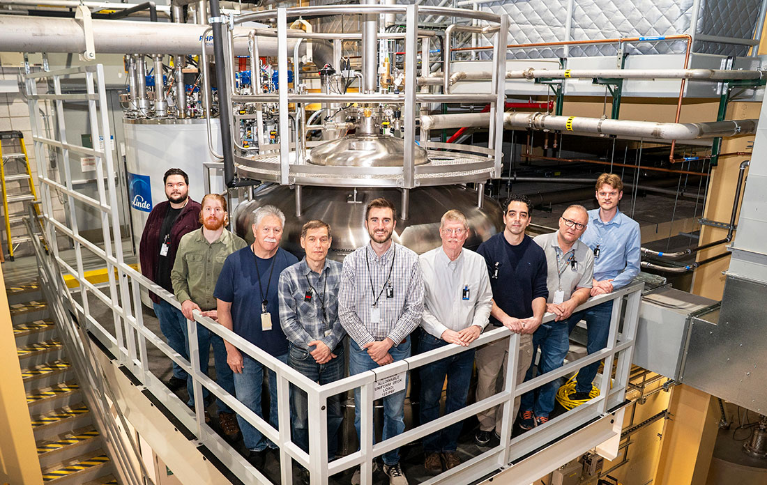 Members of the radiofrequency team with a newly installed cold box