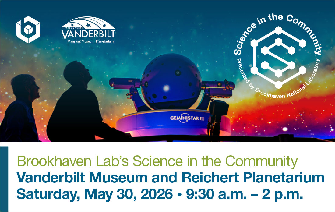 Two silhouetted figures look up at a colorful planetarium display