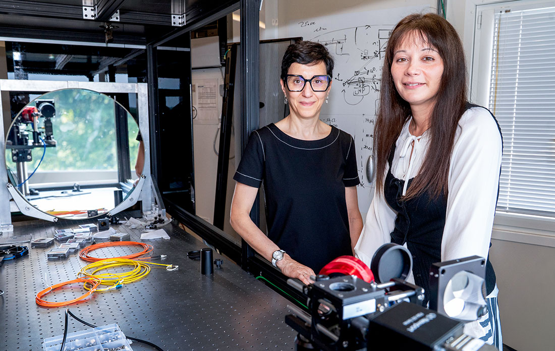 Gabriella Carini and Justine Haupt stand in Brookhaven's Quantum Lighthouse