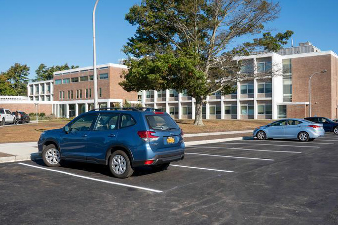 photo of cars in a parking lot