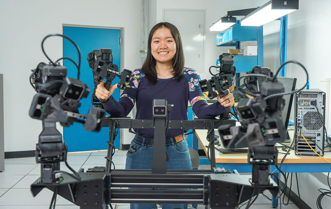 Jasmin Lin operates a robot in Brookhaven Lab's Scientific Embodied Agents Lab.